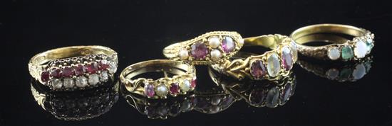 Five late Victorian & Edwardian assorted gold and gem set rings,